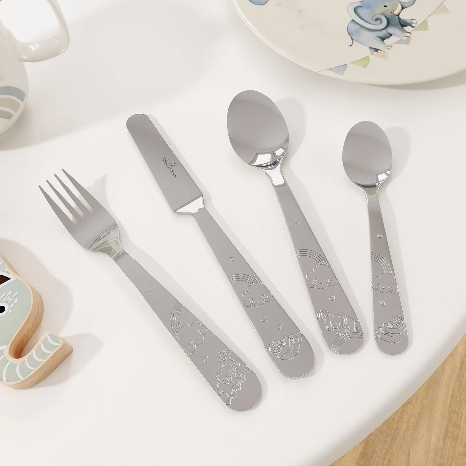 Children's 4-piece cutlery set with adorable elephant design – includes spoon, fork, knife, and teaspoon made from safe, child-friendly material.