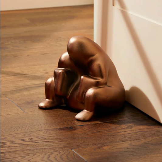 Dédé, doorstop