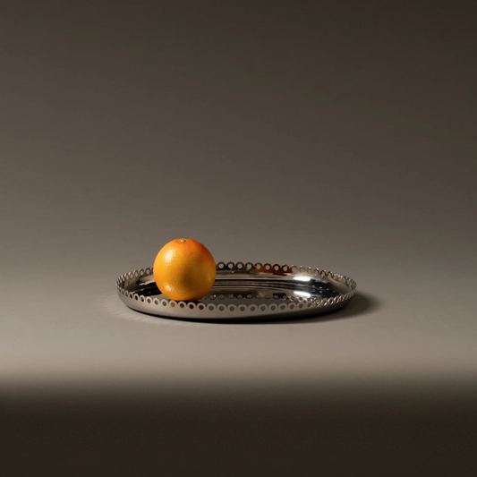 18/10 stainless steel round tray with scallops and perforated edge with a 35cm diameter 